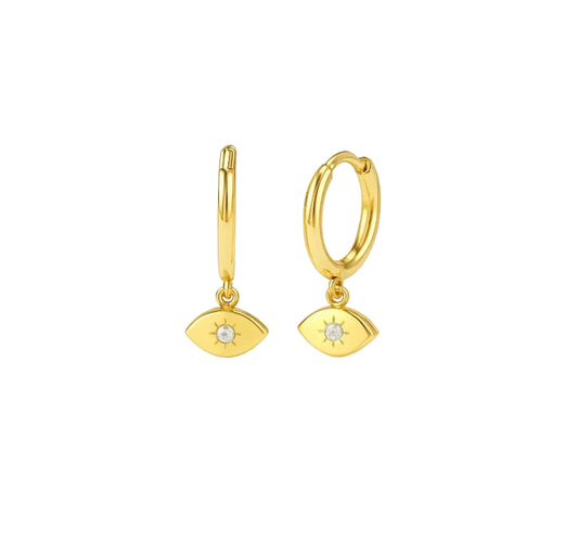 Gold hoop earrings with eye-shaped designs on a white background
